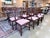 A refined set of Council dining chairs that embody the timeless character of Chippendale design. Each chair is crafted in...