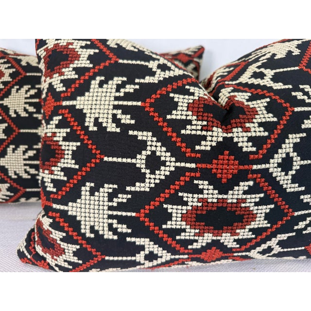 Custom pair of 16"x20" Pillows covered in Schumacher "Andean Tribute Embroidery" and backed in a black velvet. These...