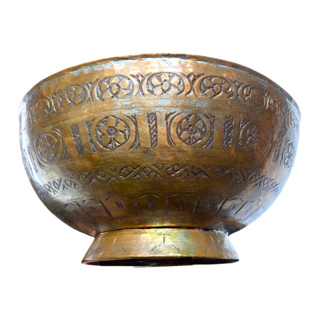 This exceptional 19th-century Persian footed bowl is a beautiful example of historic Islamic metalwork. Masterfully hand-...