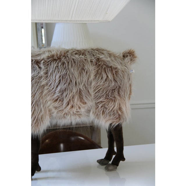 Dimensions: Length: 41" Width: 16" Height: 35" From a hand-crafted collection of realistic plush animals. Artists work in...