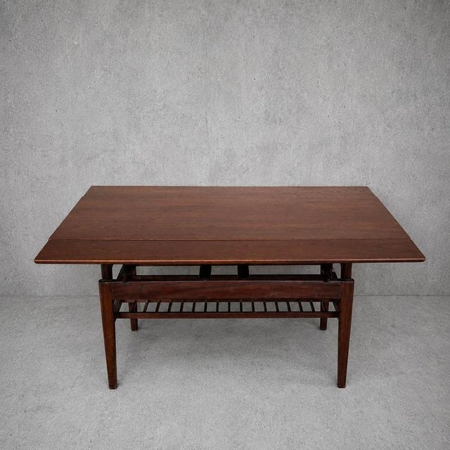 Details * Mid Century Danish design * Metamorphic elevator table mechanism * Converts from coffee table to dining table *...