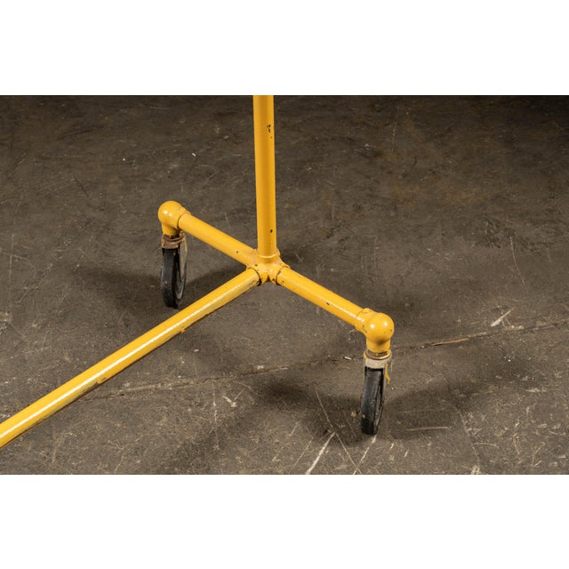 Mid 20th Century Vintage Industrial Pipe Rolling Garment Rack in Yellow For Sale - Image 5 of 6