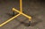 Mid 20th Century Vintage Industrial Pipe Rolling Garment Rack in Yellow For Sale - Image 5 of 6