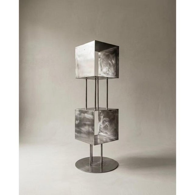 Rubik Module 1 Vertical Structure in Stainless Steel by Metalmorphosis Studio Dimensions: D 35 x W 35 x H 135 cm....