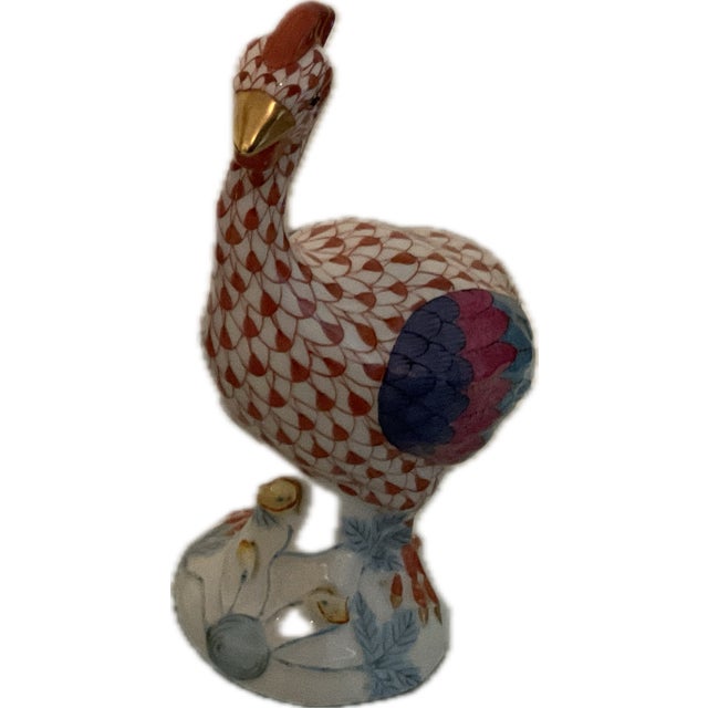 Two Herend Rust Fishnet Guinea Fowl one measures 6” the other measures 8”. The smaller has a chipped flower
