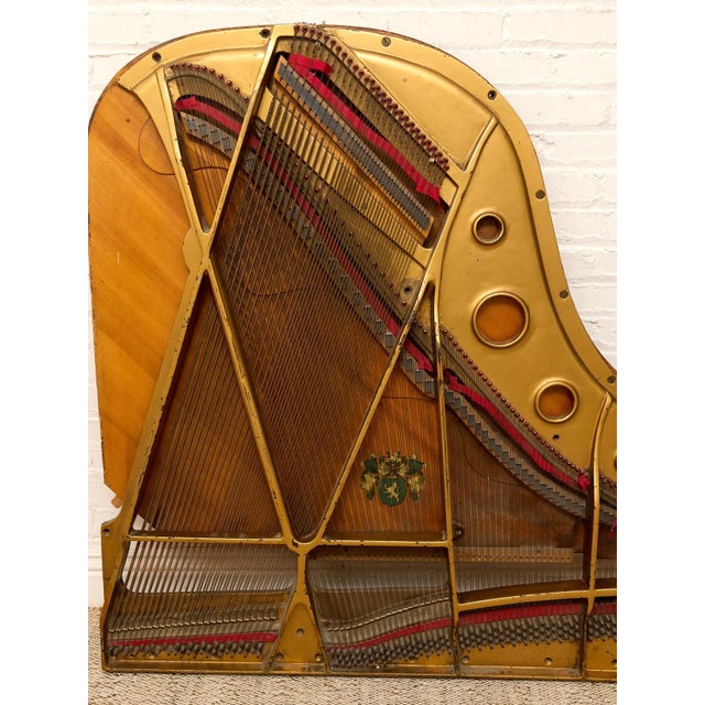 An incredible piece of found-object art made from the exposed inner harp of a piano. Stripped of its traditional cabinet,...