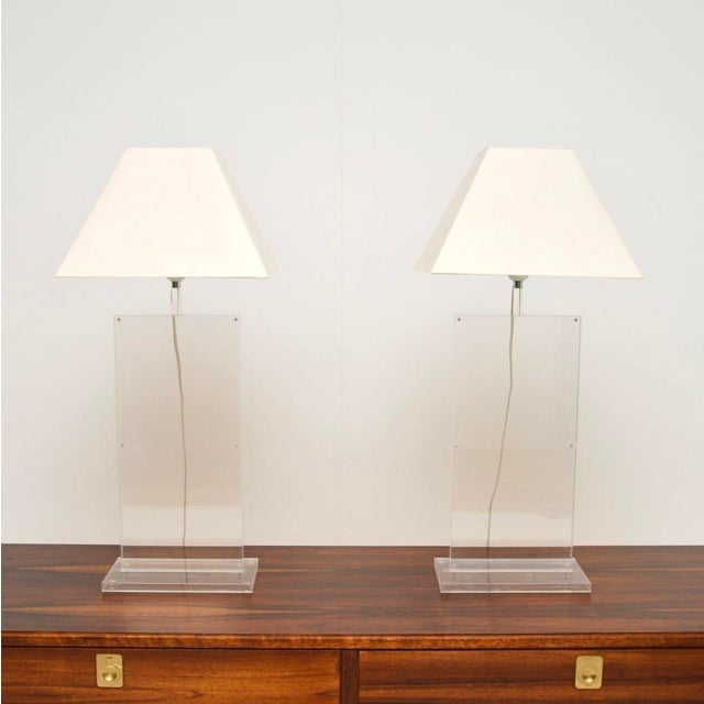 A stylish and very well made pair of vintage French acrylic table lamps, dating from around the 1970-80’s. They are a...
