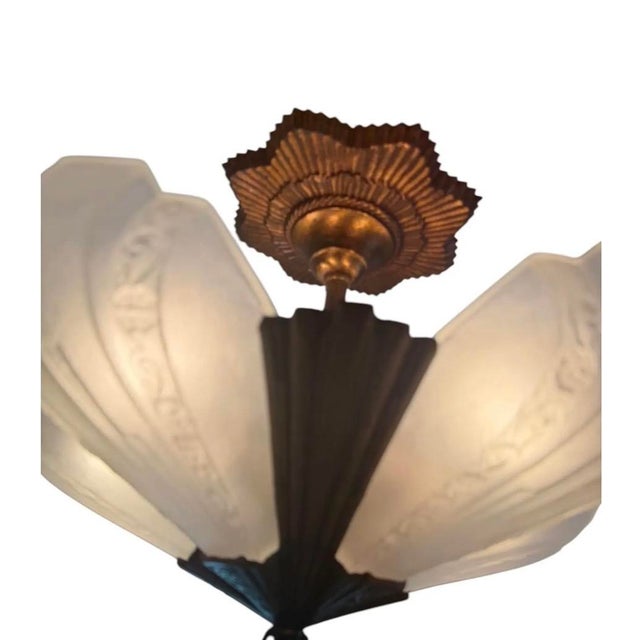 This fantastic Art Deco light fixture will look great in any room of the house. The starburst canopy is original copper...