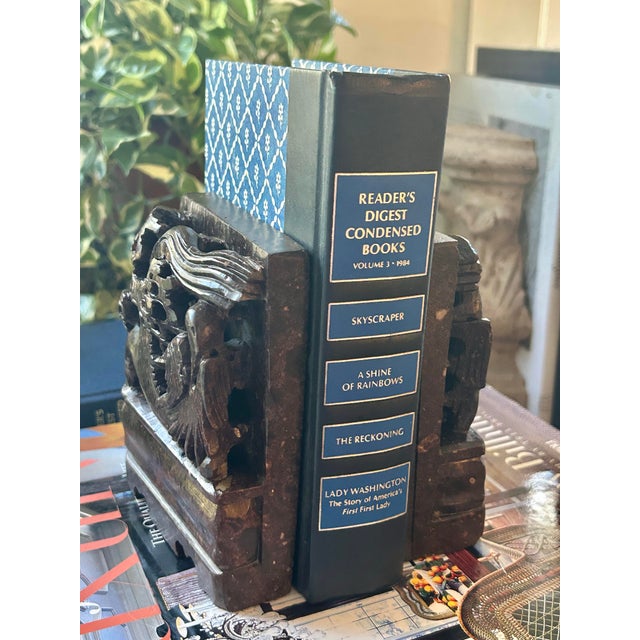 This pair of vintage Chinese soapstone bookends feature mirrored phoenix birds amid intricate pierced scrollwork. Deep...