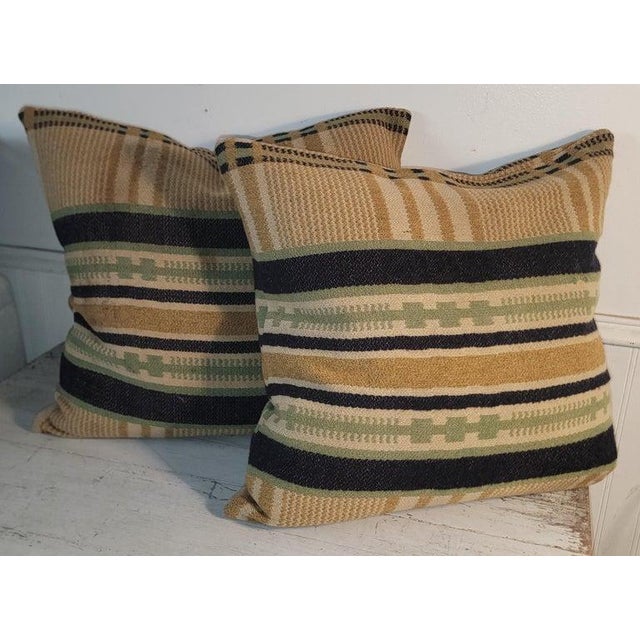 Collection of three 19thc soft wool horse blanket pillows.These blankets were used to put on the horses to keep them warm...