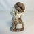 We love these seashell encrusted figurines. They are almost always from the animal kingdom. This one is an adorable dog...