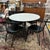 1950s Geometric Black and White Flared Iron Base Table With Leaf and 4 Chairs, Set of 6 Pieces For Sale In Miami - Image 6 of 12