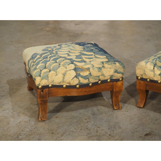 More information coming soon… Hand-carved in the style of Louis Philippe, this pair of fruitwood footstools dates to the...
