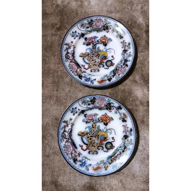 Wear consistent with age and use. The plates are in excellent condition. This piece has an attribution mark, I am sure...