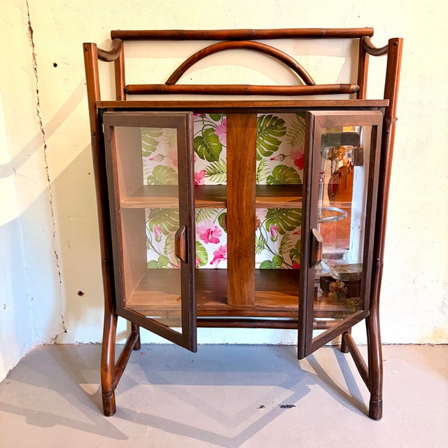 Bring a touch of island-inspired sophistication to your home with this beautifully crafted vintage bamboo/rattan cocktail...
