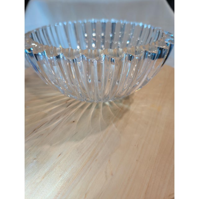 This Tiffany & Co. Crystal Glass Dish Bowl is a vintage piece with a unique heart-shaped design and signed branding. The...