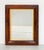 A fine English rectangular wall mirror from the 19th century, featuring an ogee frame of figured wood with a giltwood slip...