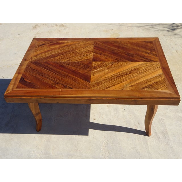 Sturdy 1950s walnut table. Herringbone marquetry top on a solid walnut frame: tabletop edge, legs, and apron. Sycamore...