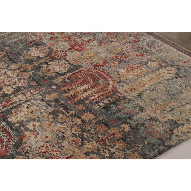 Made with a luxurious blend of hand-knotted wool and silk, this 12x15 contemporary rug is a bold addition to Rug & Kilim’s...