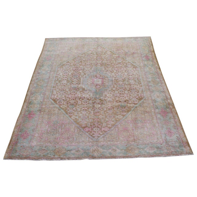 Hand-knotted with care using traditional rug-making techniques, this wool rug blends timeless craftsmanship with a modern...