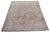 Hand-knotted with care using traditional rug-making techniques, this wool rug blends timeless craftsmanship with a modern...