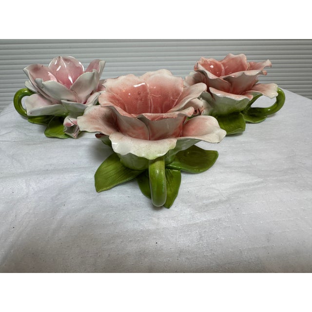 Design Plus Gallery presents a Set of Three Blooming Candle Holders. Their style is Capodimonte, an extravagant technique...