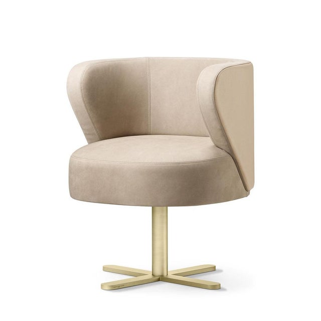 The Spritz Chair effortlessly combines sophistication with playful functionality. This dining chair features a 360° swivel...