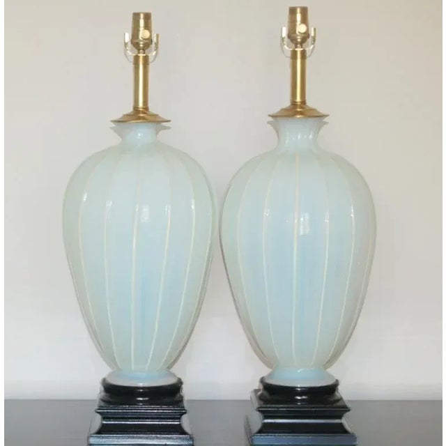 Statuesque, creamy WHITE OPALINE Murano glass lamps from Marbro that read as SOFT BLUE. If you follow our products, you...