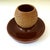 An attractive English pottery match striker featuring a textured spherical striker mounted on a rich brown glazed base....