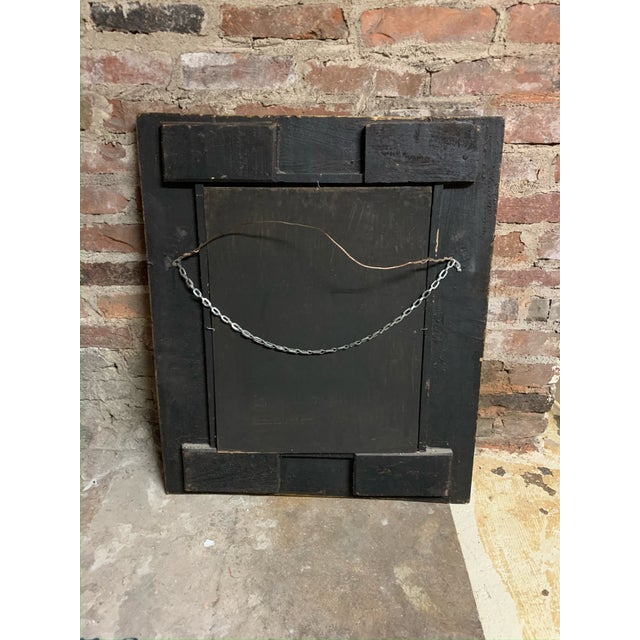 Carved wood framed mirror with matte gold paint over chinese red paint in an aged, vintage style, Unknown Maker