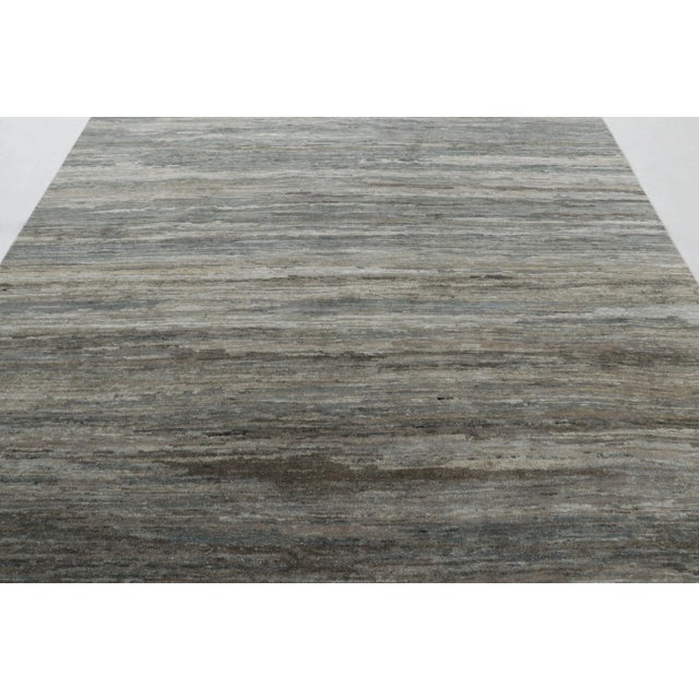 This 8x10 rug from Rug & Kilim’s Textural Collection is a luminous, textural work of art, hand-knottRug & Kilim's Solid...