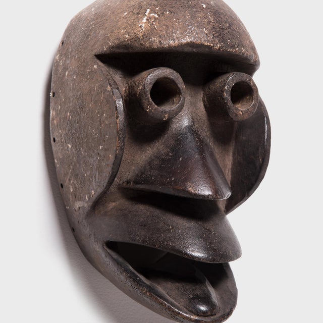 Attributed to the Dan people of Liberia and Cote d'Ivoire, this monkey mask is one of many spirit masks believed to...