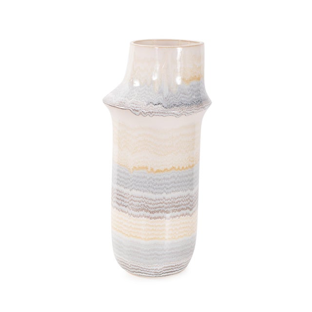 Featuring soft, layered bands of taupe, sand, and stone-gray tones, this ceramic piece captures the subtle beauty of...