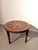 Add an exotic and timeless accent to your interior with this beautifully handcrafted antique Indian side table. Made from...