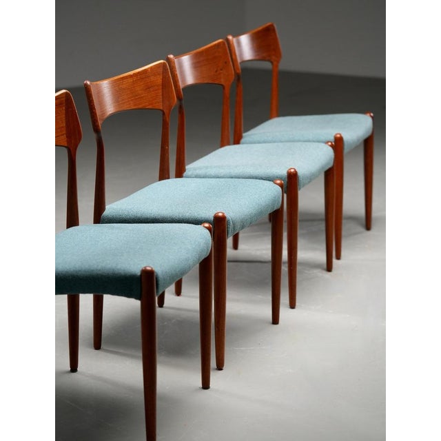 Looking for some fresh and crisp Danish elements in your house A set of 4 newly upholstered teak chairs in petrol blue...