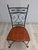 Wrought-iron metalwork chair in a retro style. The chair is made of forged steel, also known as metalwork. The seat is...