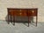 Elegant vintage Thomasville sideboard featuring a graceful bowfront silhouette, richly figured mahogany finish, and...