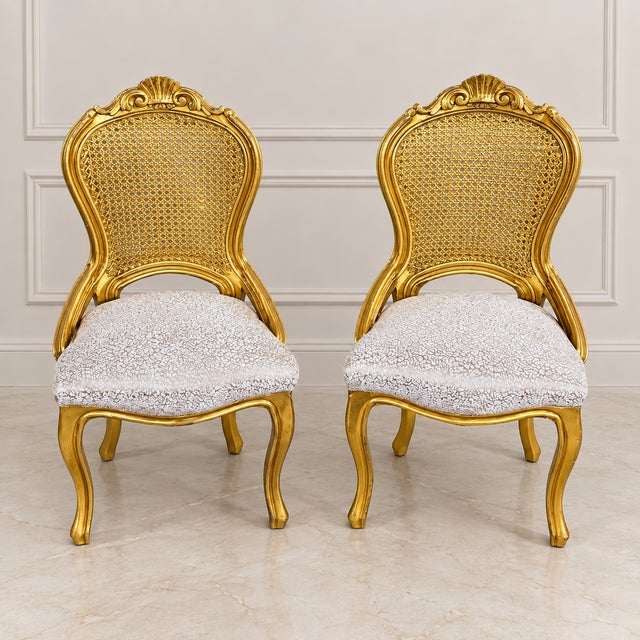 Bring refined French-inspired elegance to your interior with this matching set of two decorative side chairs. Each chair...
