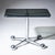 Glass table featuring a rectangular clear-glass top with rounded corners. The structure incorporates a cross-shaped...