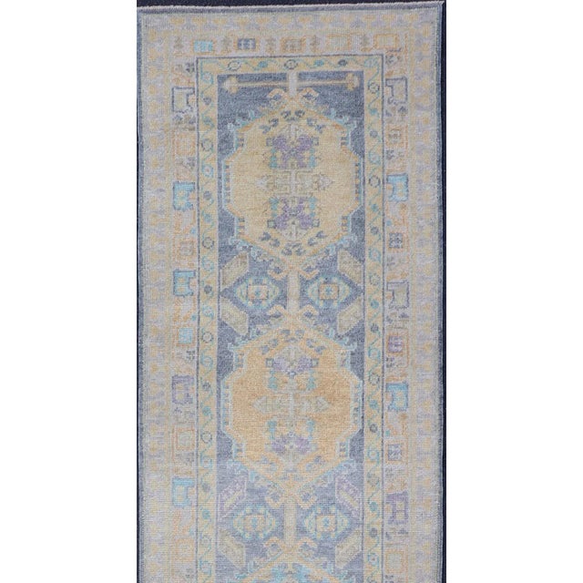 Measures: 2'7 x 10'1 Turkish Oushak Runner in Pale Blue and Soft Gold Medallion Design 2'7 x 12'1. Keivan Woven Arts. rug...