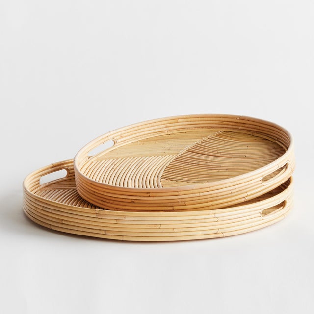 This exquisite set of Jelani cane trays are truly high end. Cane rattan is bent by hand and inlaid by highly skilled...