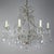 French crystal beaded 8-arm chandelier with faceted almond shaped crystals throughout. The fixture is adorned with...