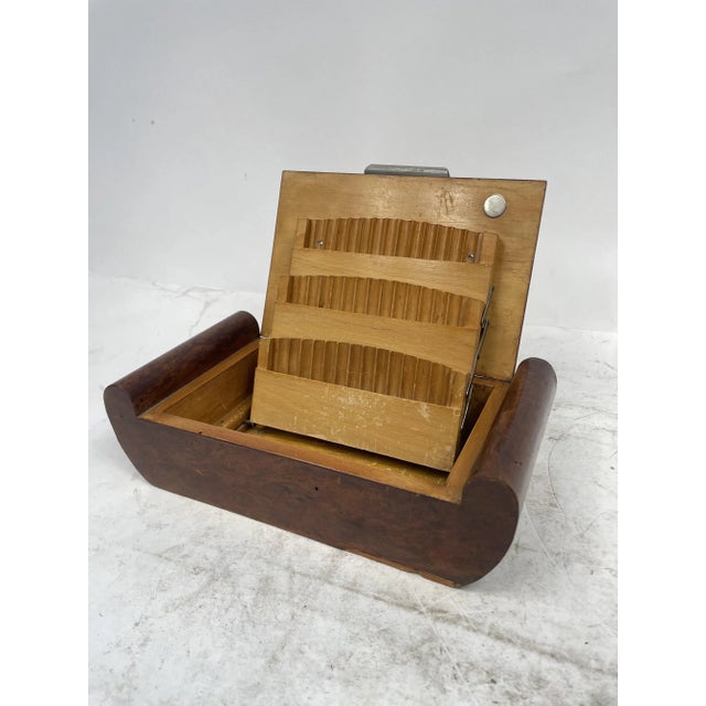 Antique and refined wooden cigarette holder, Art Deco from the 1920s. Very elegant and well finished object, with...