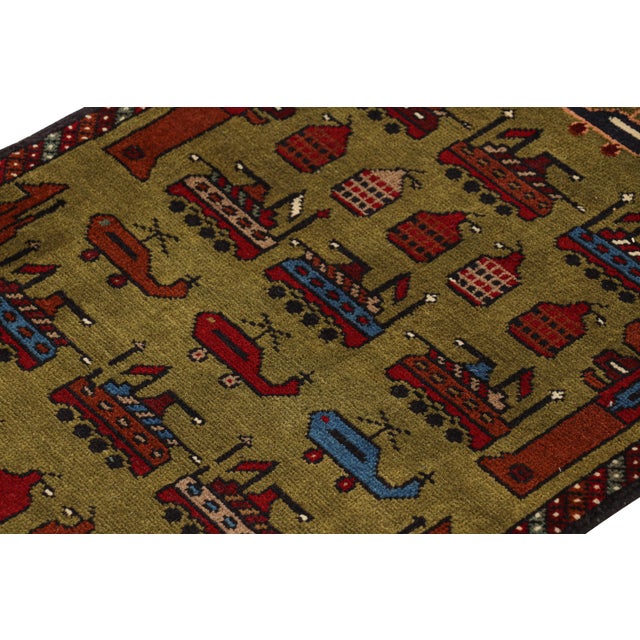 Hand knotted in wool, this 2x3 modern pictorial rug represents a new line of tribal carpets in the Modern Classics...