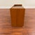 Vintage teak one-person bench with storage, made in the U.K. by Nathan Furniture circa 1970's. Designed for a corded...