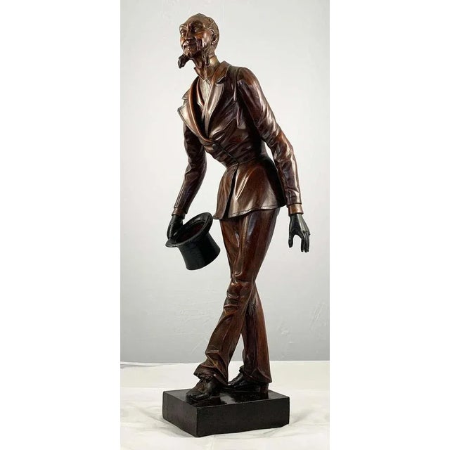 An extremely fine european polychrome carved wood figure of a dickensian character, circa 1900. In the form of a gentleman...