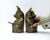 Brass Pig Bookends. This listing is for an adorable set of brass pig bookends. Add these charming pigs to any room for...