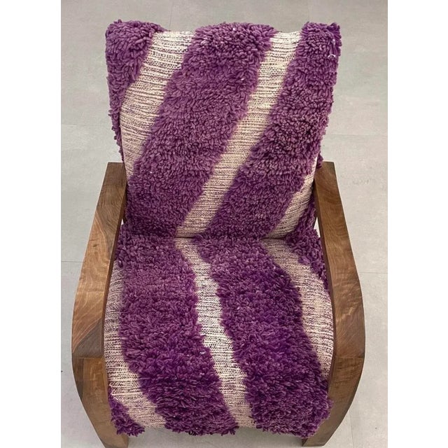 Handcrafted Moroccan Armchair - Purple Wool Rug Upholstery Transform your living space with this unique Moroccan armchair,...