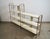 Vintage 1950's Mid century Modern double bookcase for sale. It's a very rare and unique shelf with a unique design, and is...