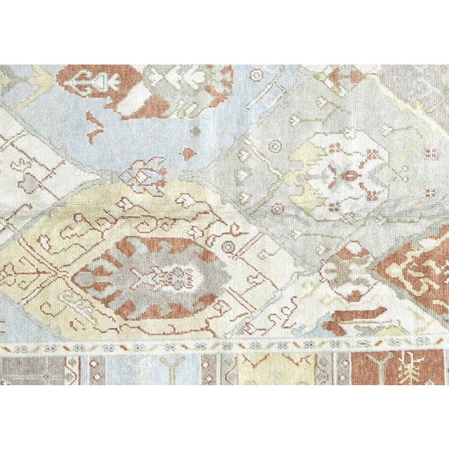 1980s Turkish Oushak Carpet. Handwoven with wool on wool foundation in the Oushak region of Western Turkey. Oushak in...